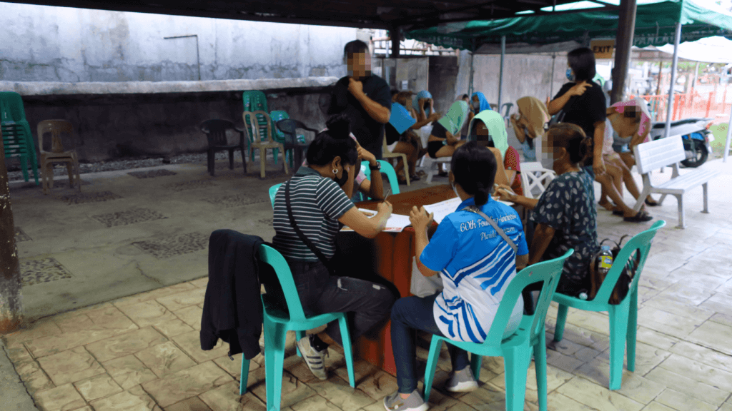 group sits around table after raid