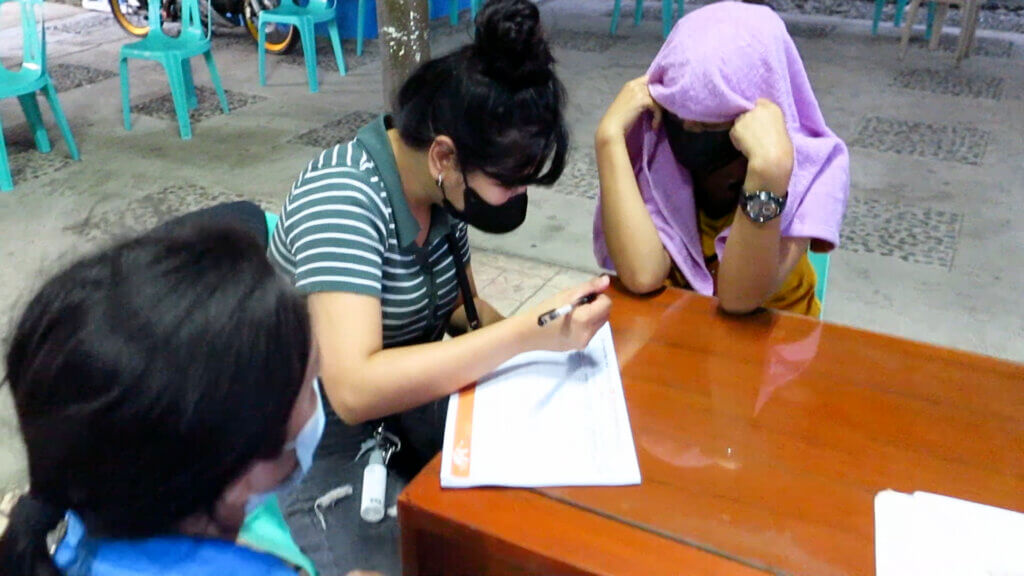 rescued girls with case worker during intake