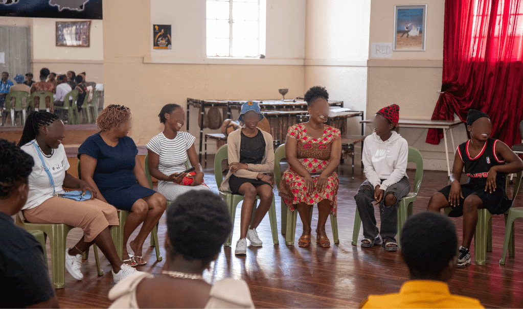 Survivors in our programming and staff in Zimbabwe during a recent celebration