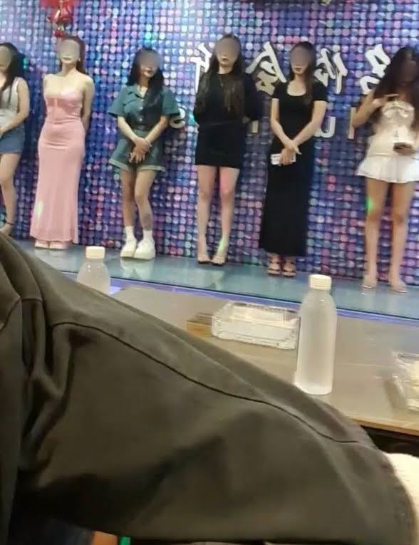 The girls wait to see if anyone purchases them for sex